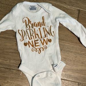 Baby newborn “brand sparkling new” onesie